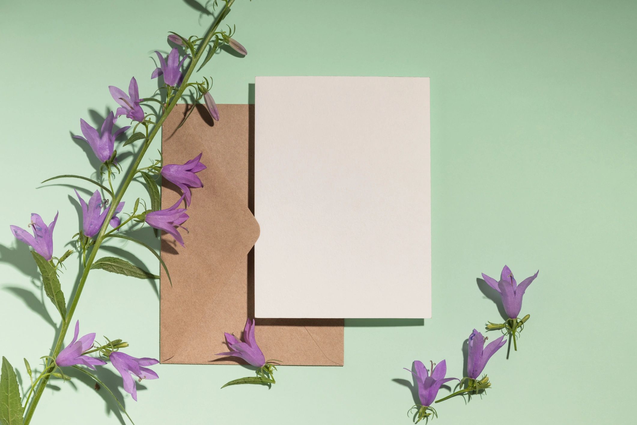 Styled greeting card and envelope flat lay